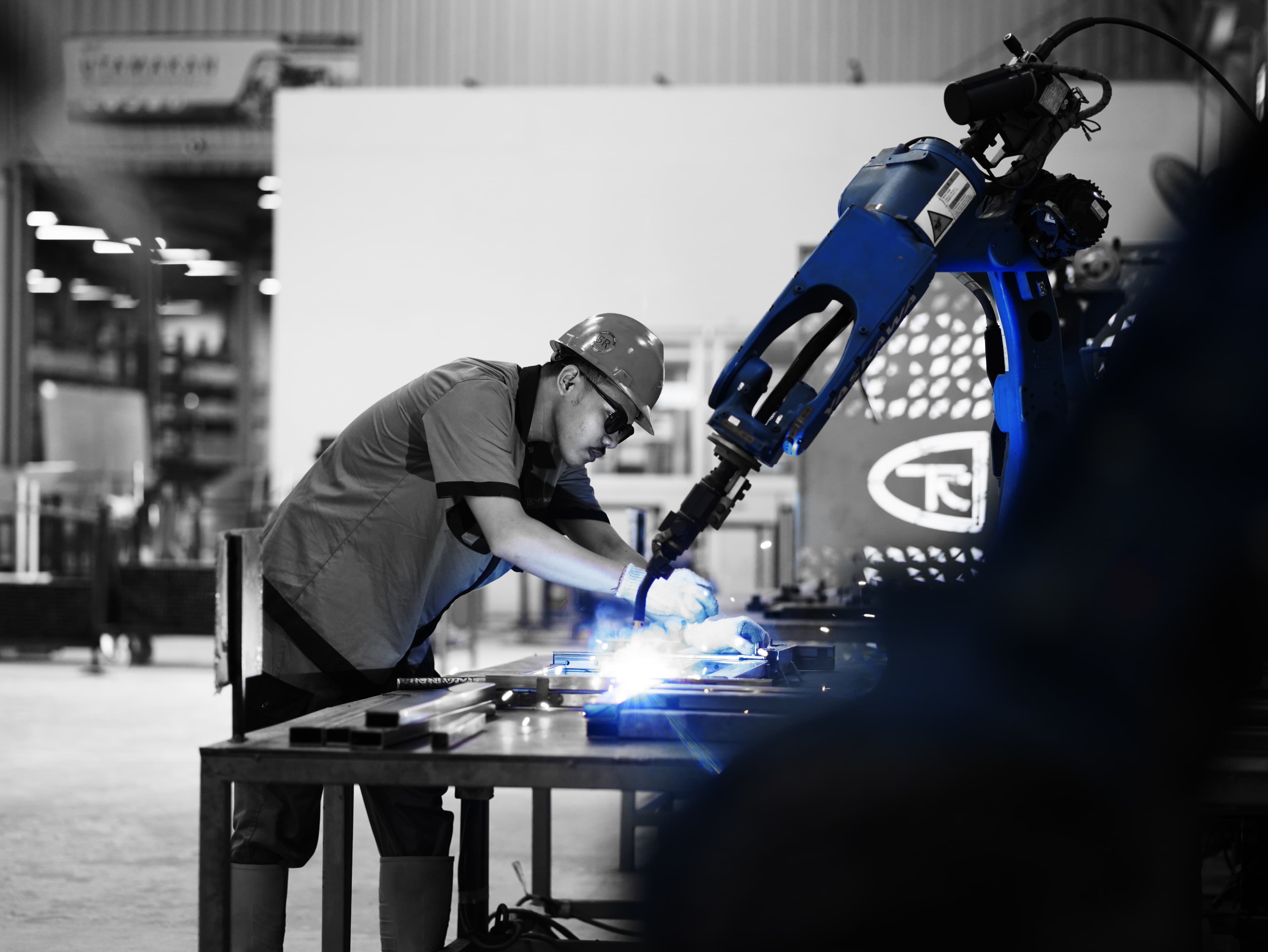 Legano factory worker at the production line